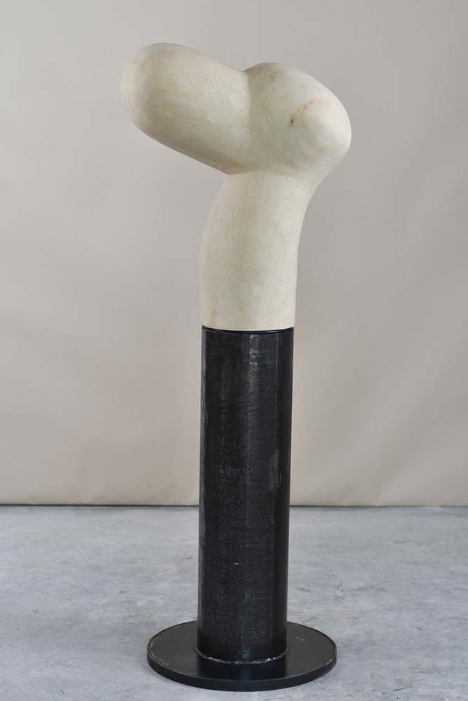 Friend, an abstract limestone and steel sculpture by contemporary sculptor Jay Swift, shown in full view