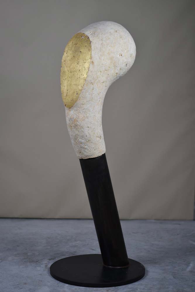 Ghost, a 2025 limestone, gilding and steel sculpture by Jay Swift, shown in full view