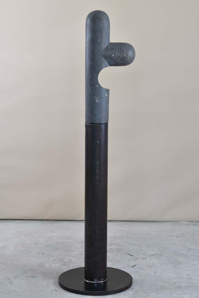 Here Now, a 2023 limestone and steel sculpture by Jay Swift, shown in full view